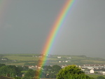 27058 Rainbow over fields and houses.jpg